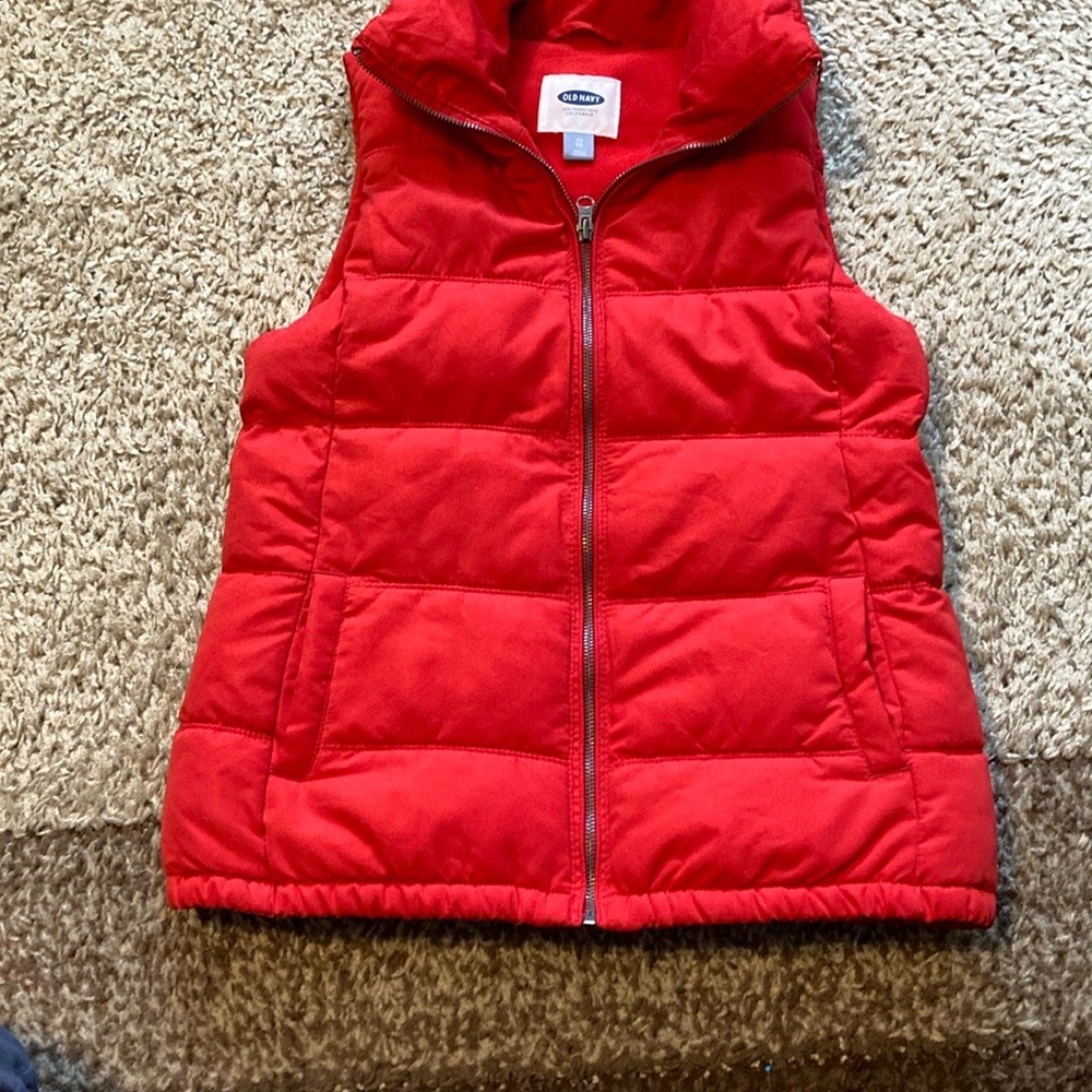 Old Navy women’s Red Puffer Vest with fleece lining.
